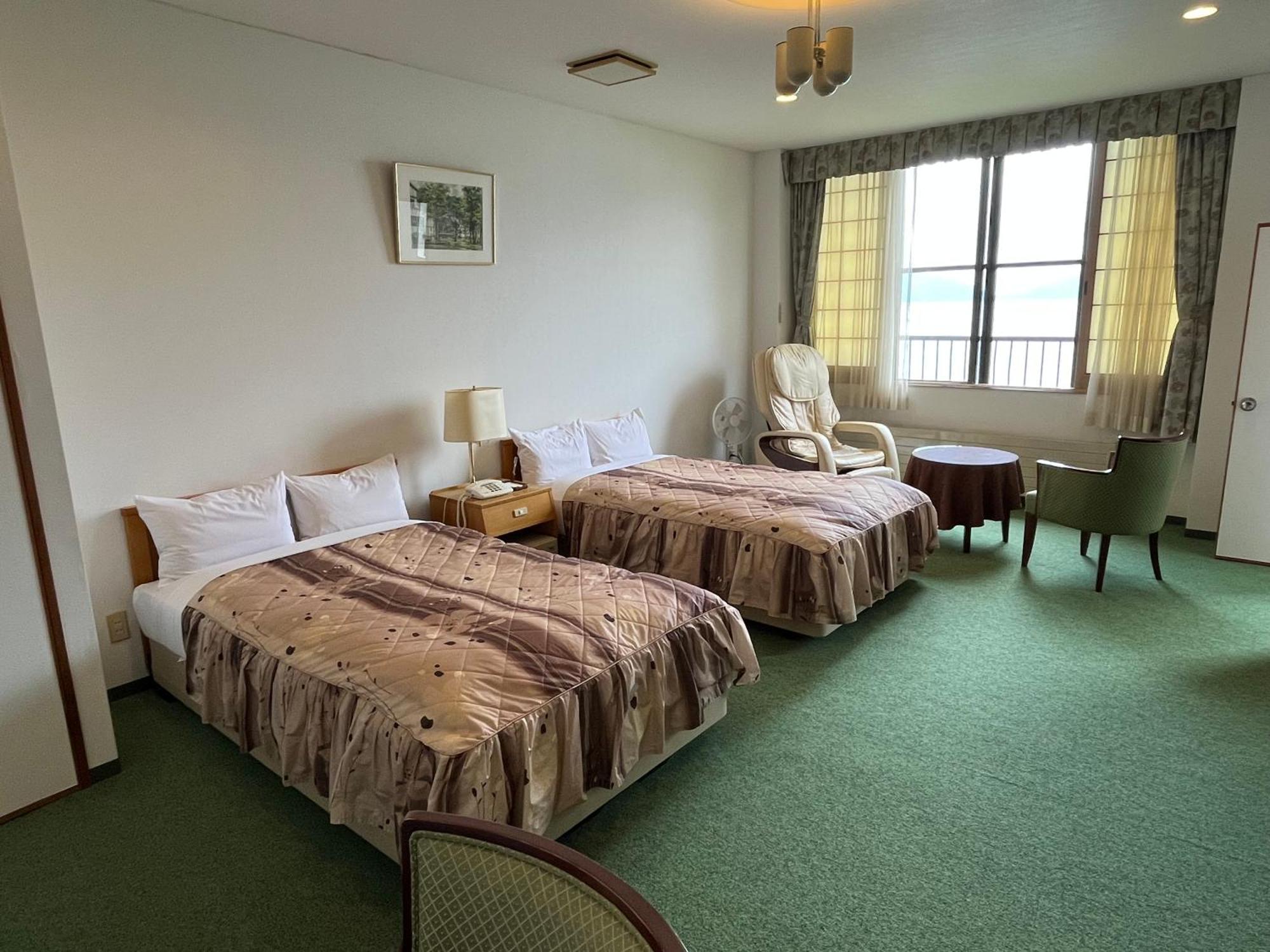 צ'יטוסה Marukoma Onsen Ryokan מראה חיצוני תמונה