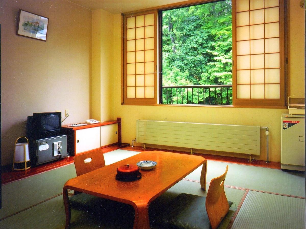 צ'יטוסה Marukoma Onsen Ryokan מראה חיצוני תמונה